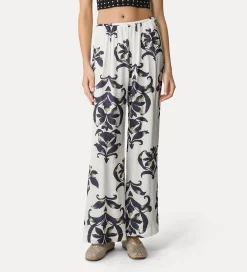 Hot forte_forte pantaloni flared raso “the secret lily” orchidea